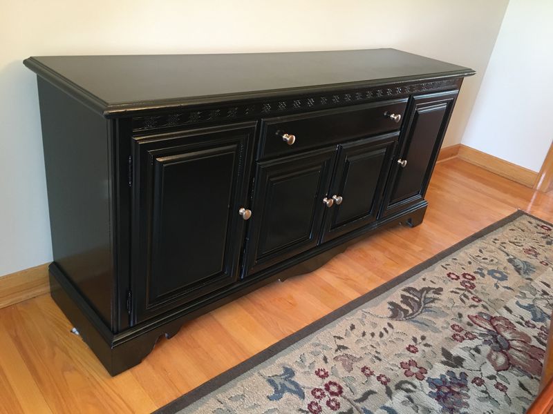 Wood sideboard refinished in black
